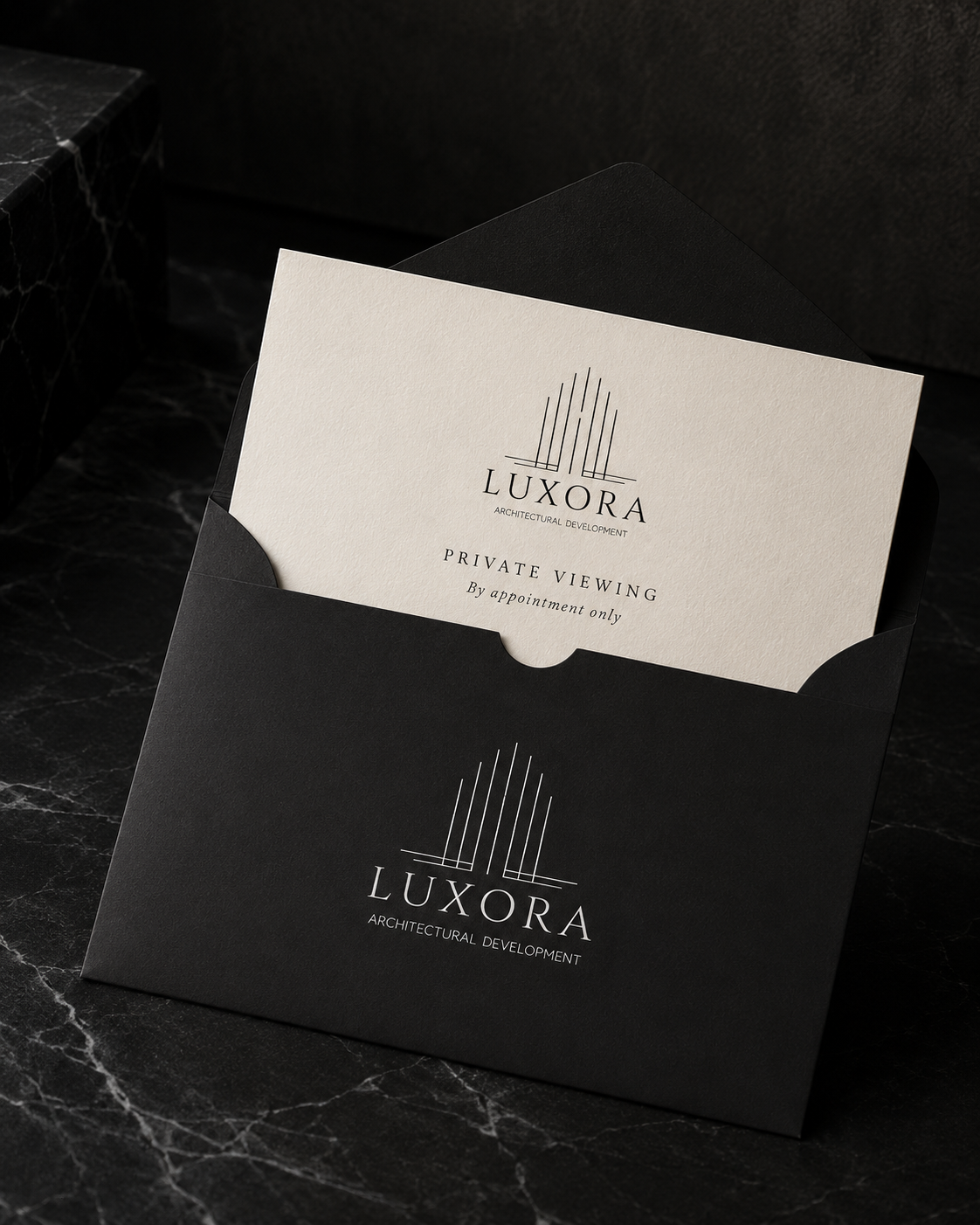 LUXORA private-viewing invitation and black envelope
